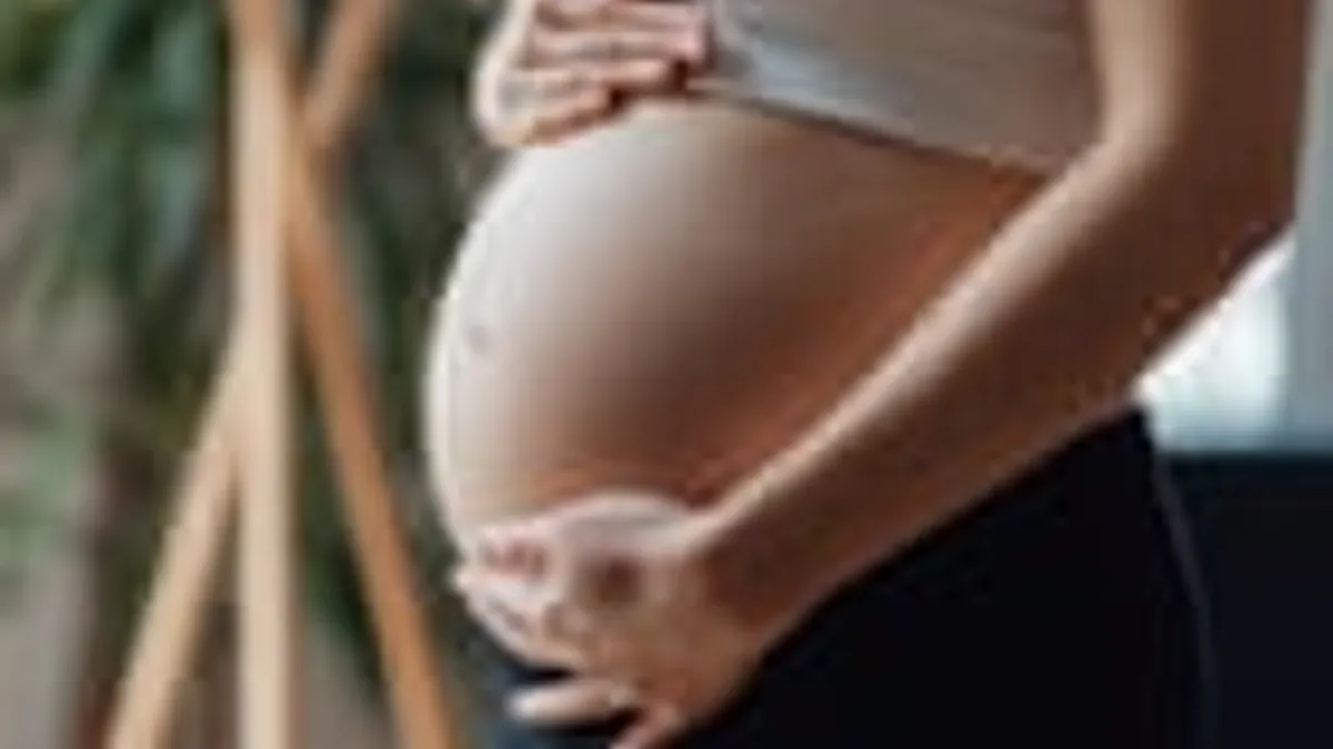 Bending forwards a lot at work in early pregnancy may increase miscarriage risk, study suggests